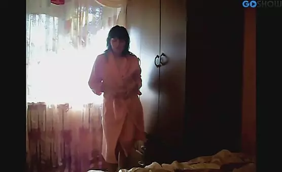 Brunette Seduces in a Bathrobe