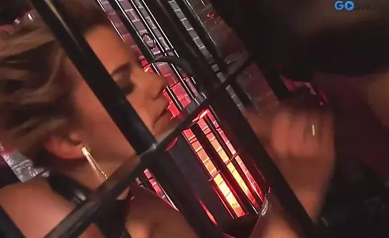 Slutty blonde in masked cage receives intense fuck session and deepthroat blowjob